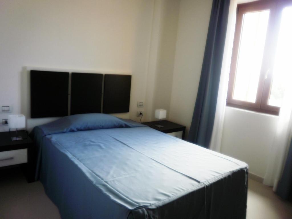 Buddi Hotel Platamona Værelse billede