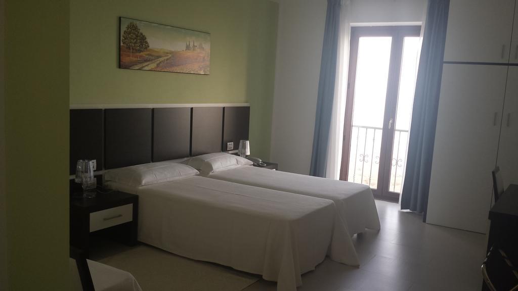 Buddi Hotel Platamona Værelse billede